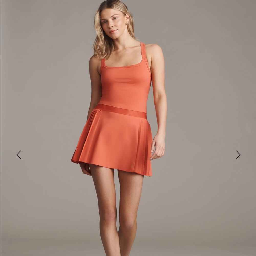 NEW RHONE mirage pleated tennis skort in sienna red XS